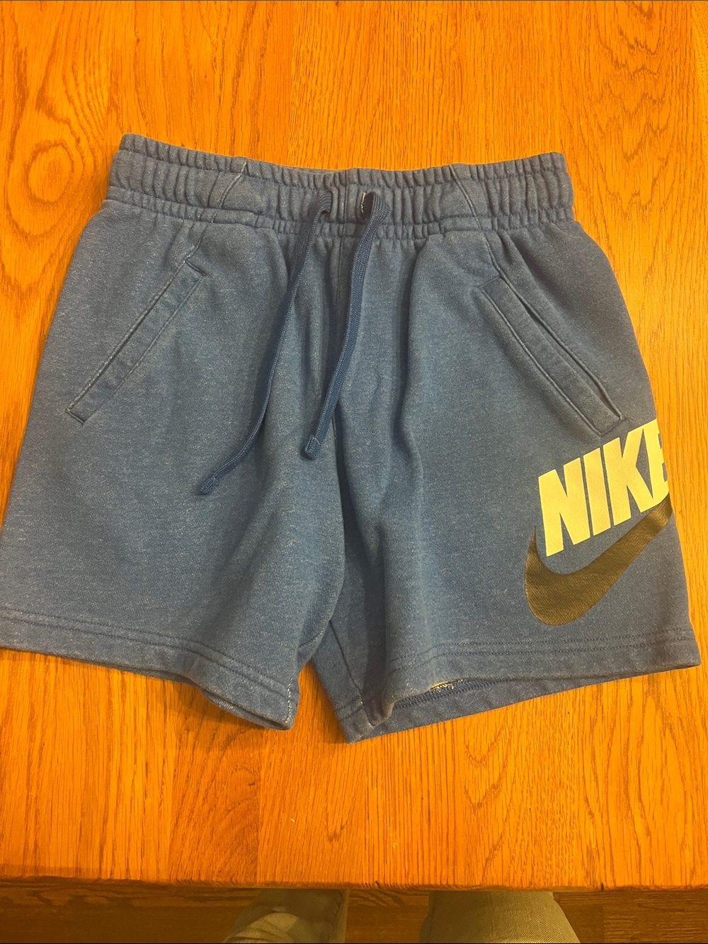 Nike Blue Shorts with White Logo and Black Swoosh